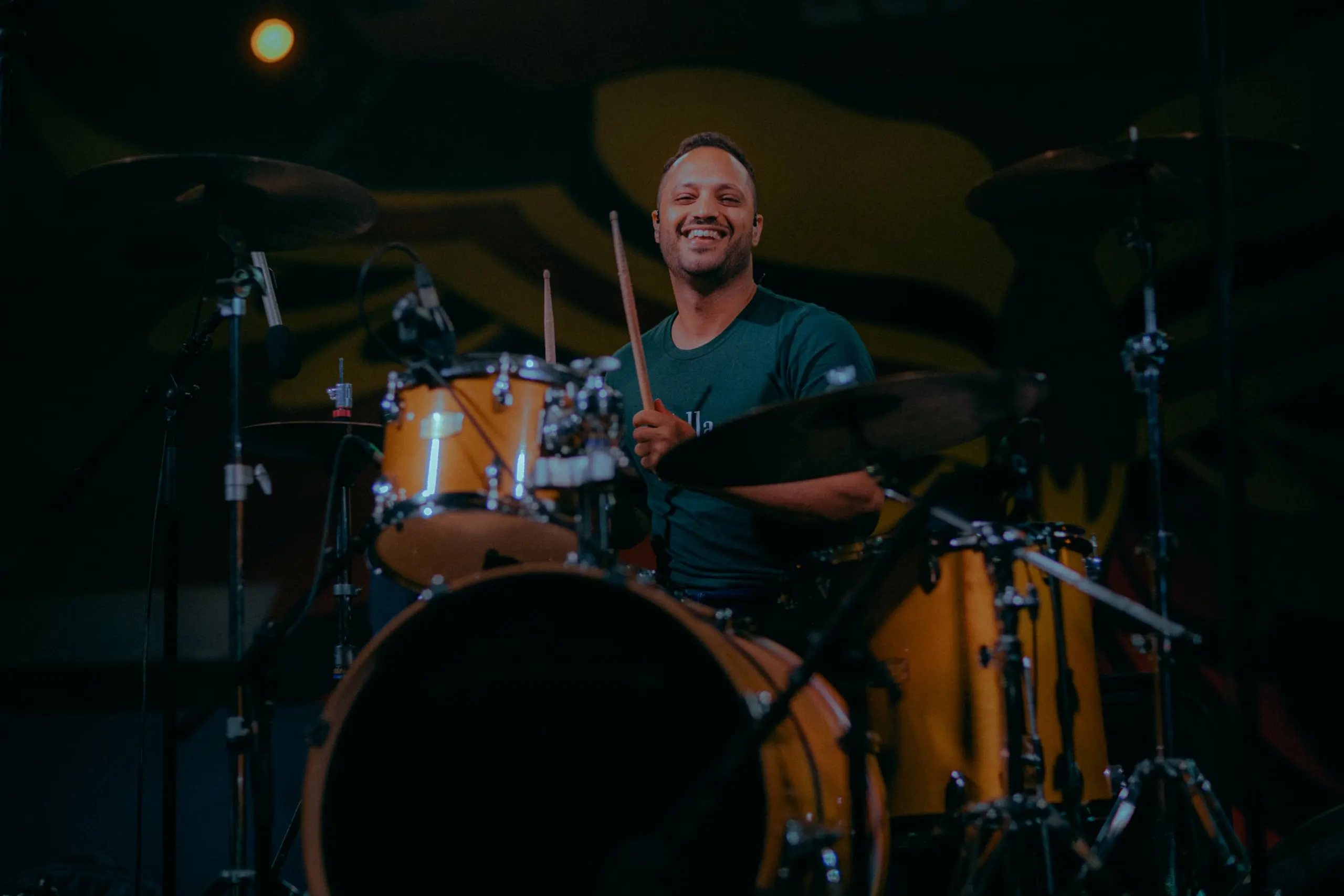 The City Revival's drummer smiling behind the kit